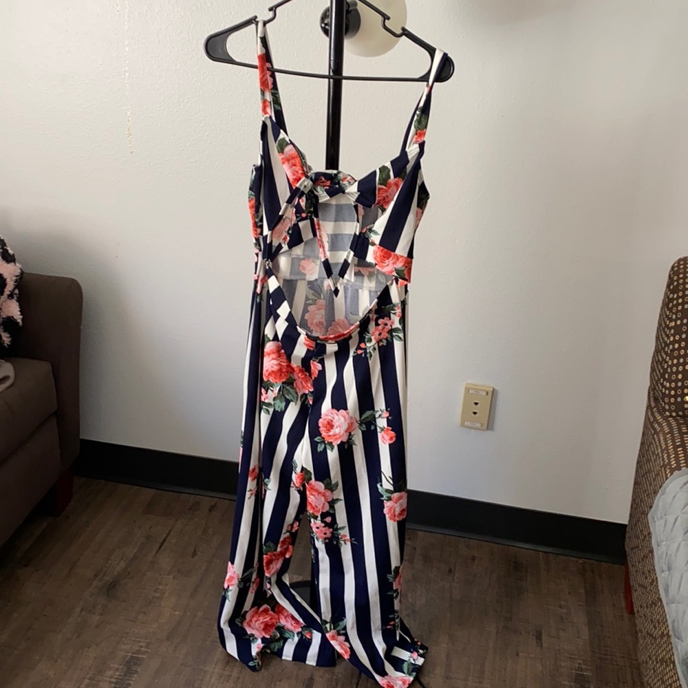 Daylight jumpsuit with tie up slit in front